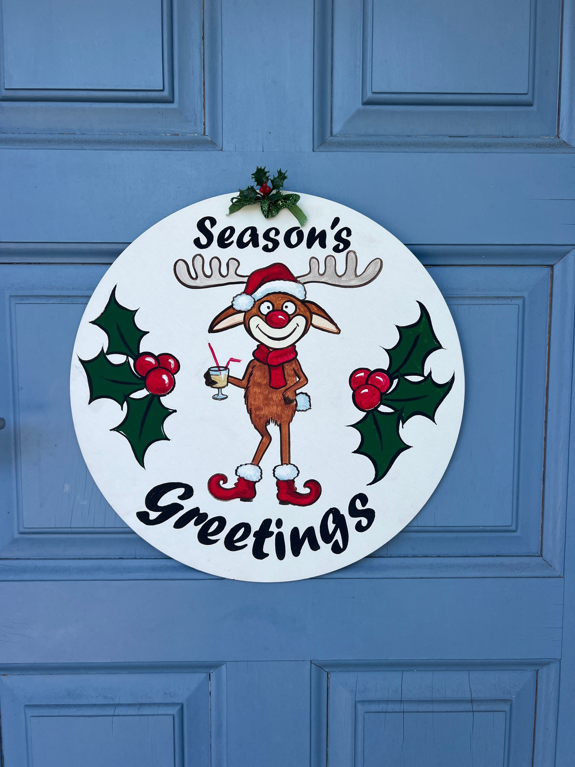 A drawing of a mojito with ice and mint leaves