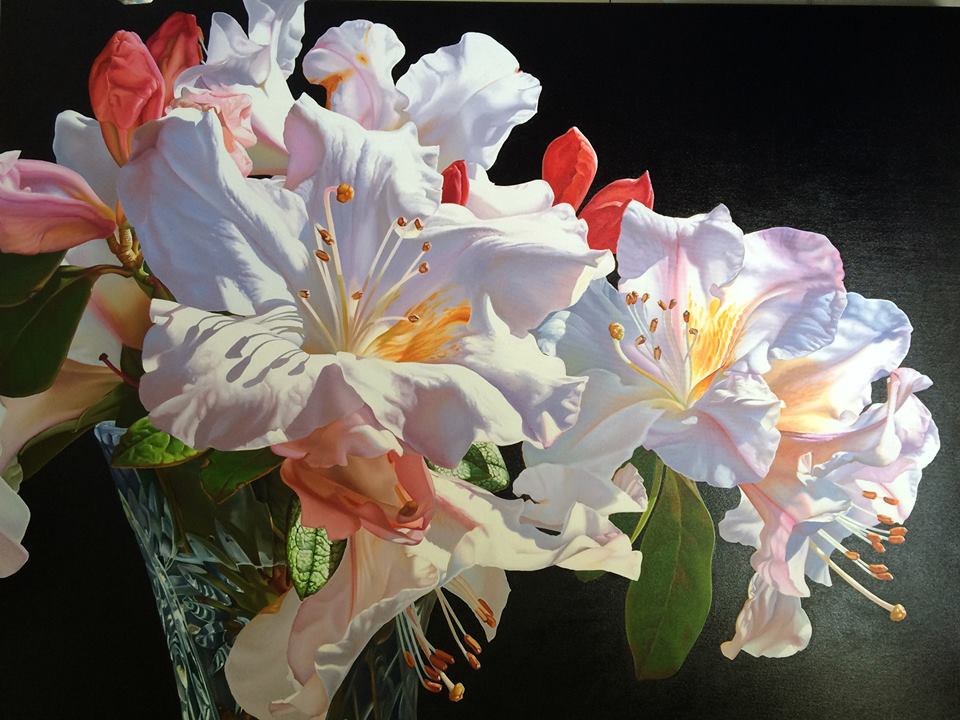 A painting of white and pink flowers on a black background