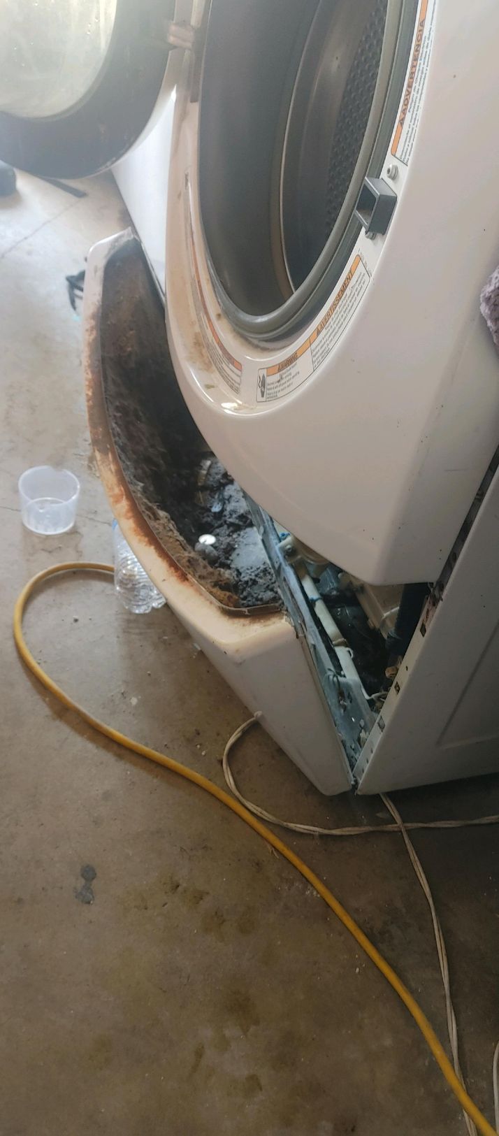front of a washing machine rusted