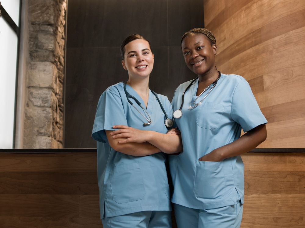 Two Smiling Nurses
