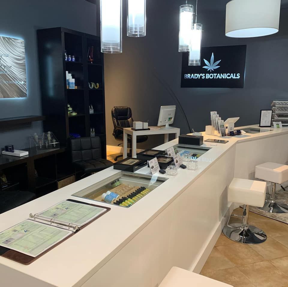 Brady 's botanicals is written on the wall above the counter