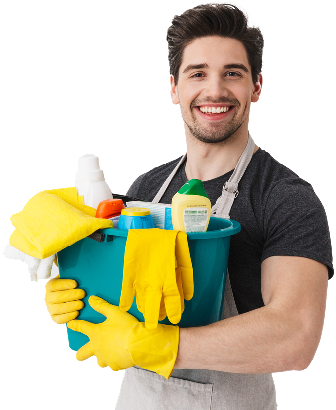 A man wearing yellow gloves is holding a bucket of cleaning supplies.