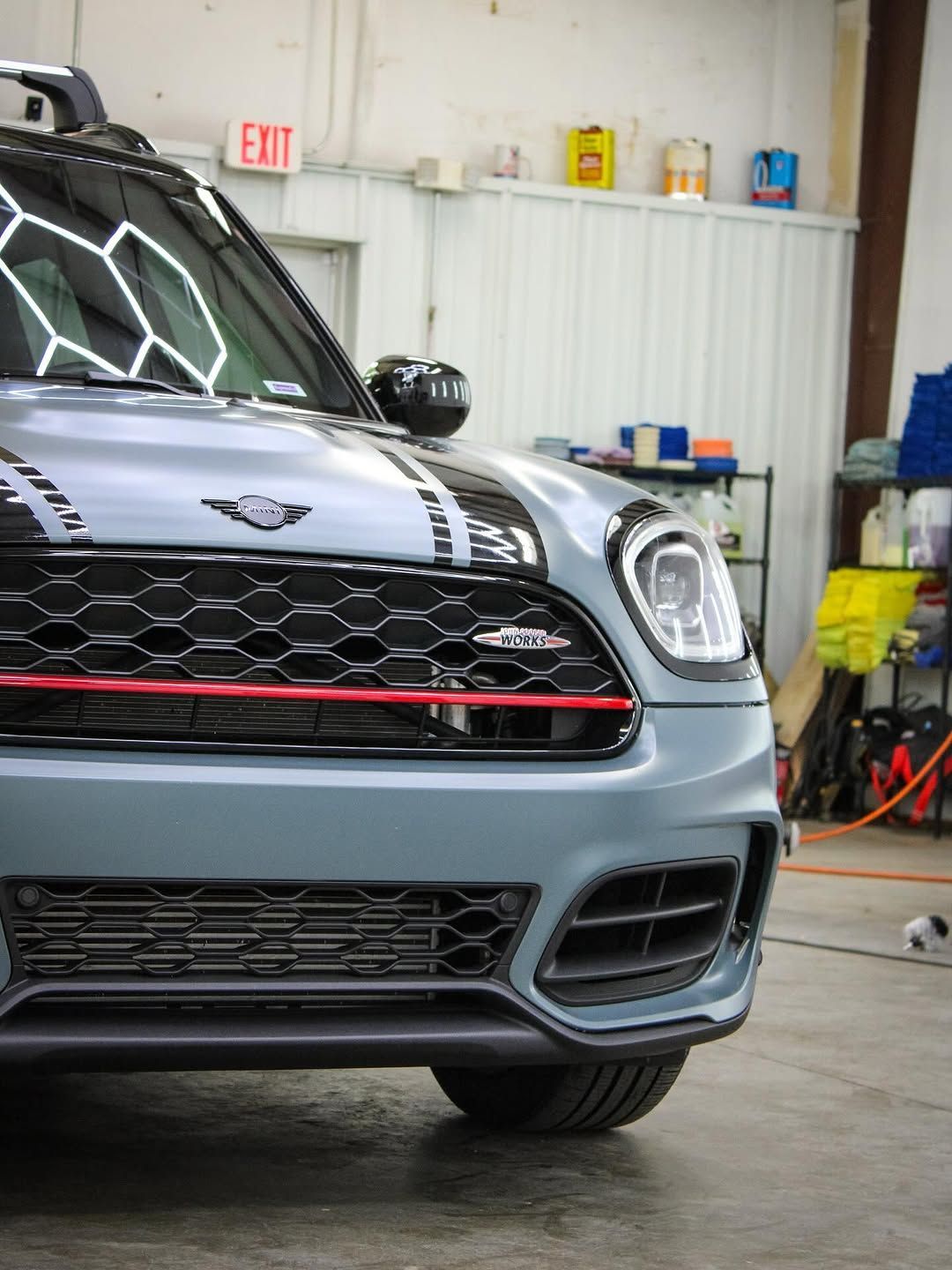White BMW SUV parked in a driveway.