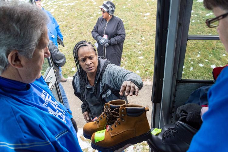 Handing out boots by the Youngstown Blue Coats