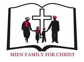 A silhouette of a family wearing traditional headwear in front of a cross, set inside an open book. 