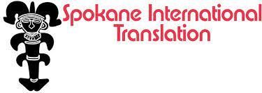 Spokane International Translation logo with black tribal-style figure next to red text on a white background.