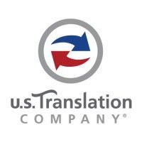 Logo of U.S. Translation Company featuring a gray circular border around two curved blue and red arrows.