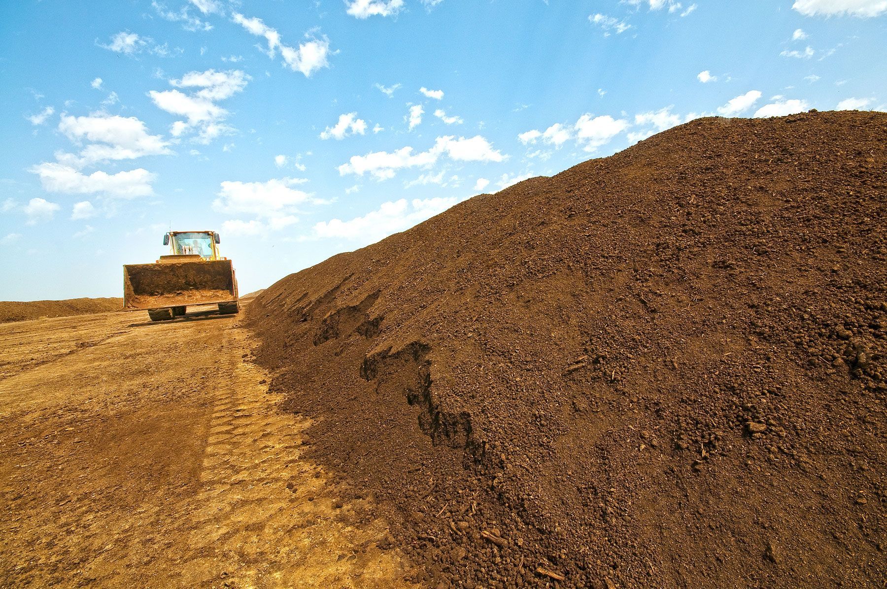 composted soil pile at the compost plant