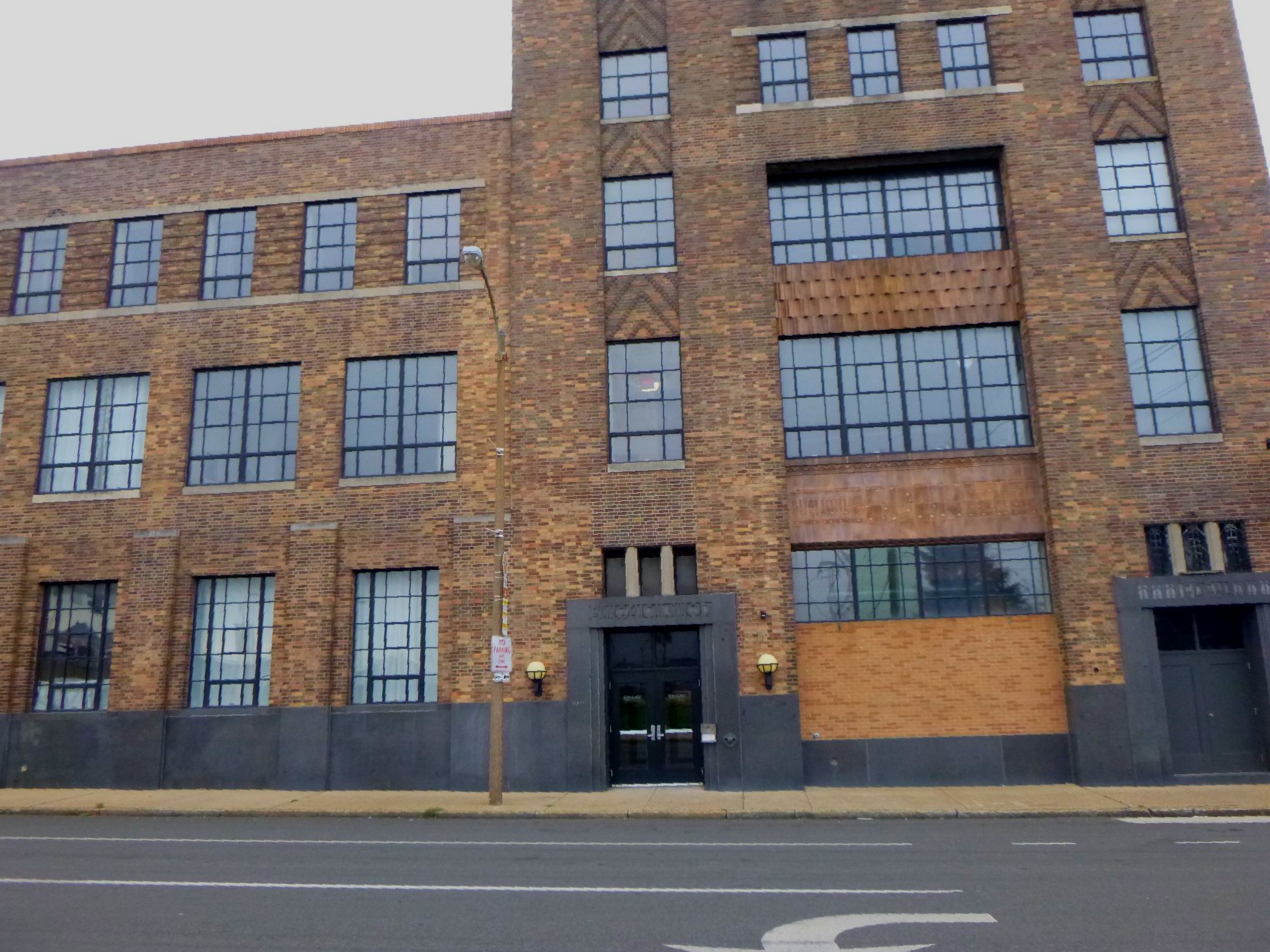 A large brick building with a lot of windows
