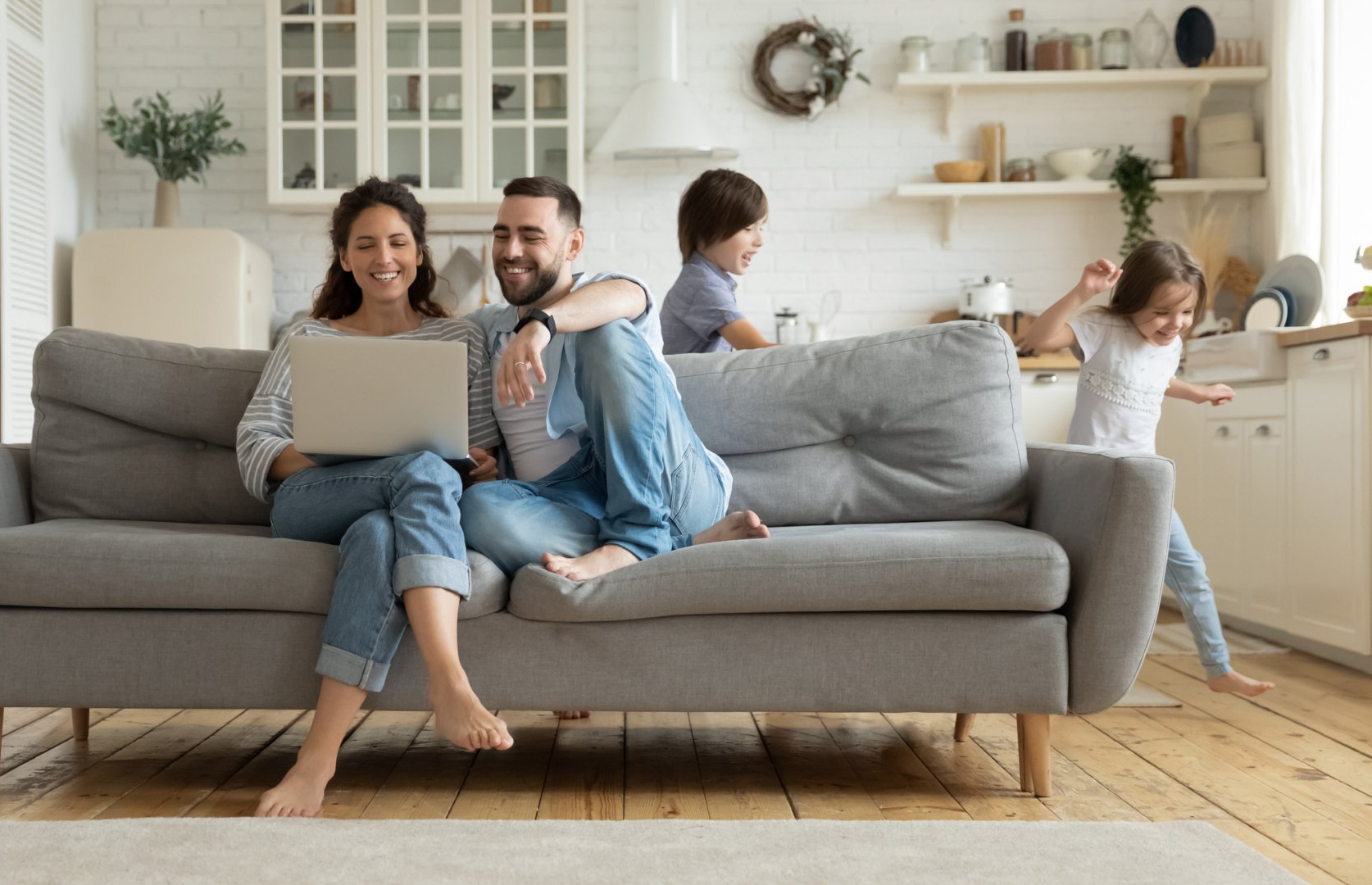 Family sitting on couch