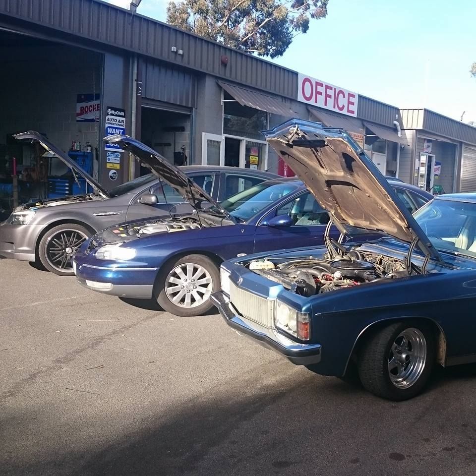 Car's A/C controls, MAX A/C button, dashboard lights, and a mechanic servicing A/C unit with diagnostic equipment.