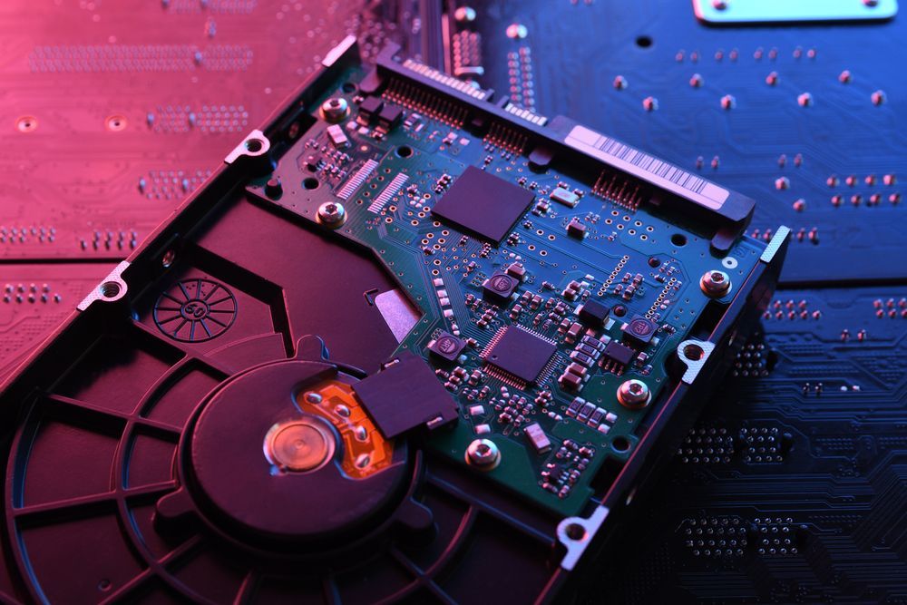 Hard Drive Circuit Board, Electronics and Components Illuminated — Tech Aid In Moffat Beach, QLD