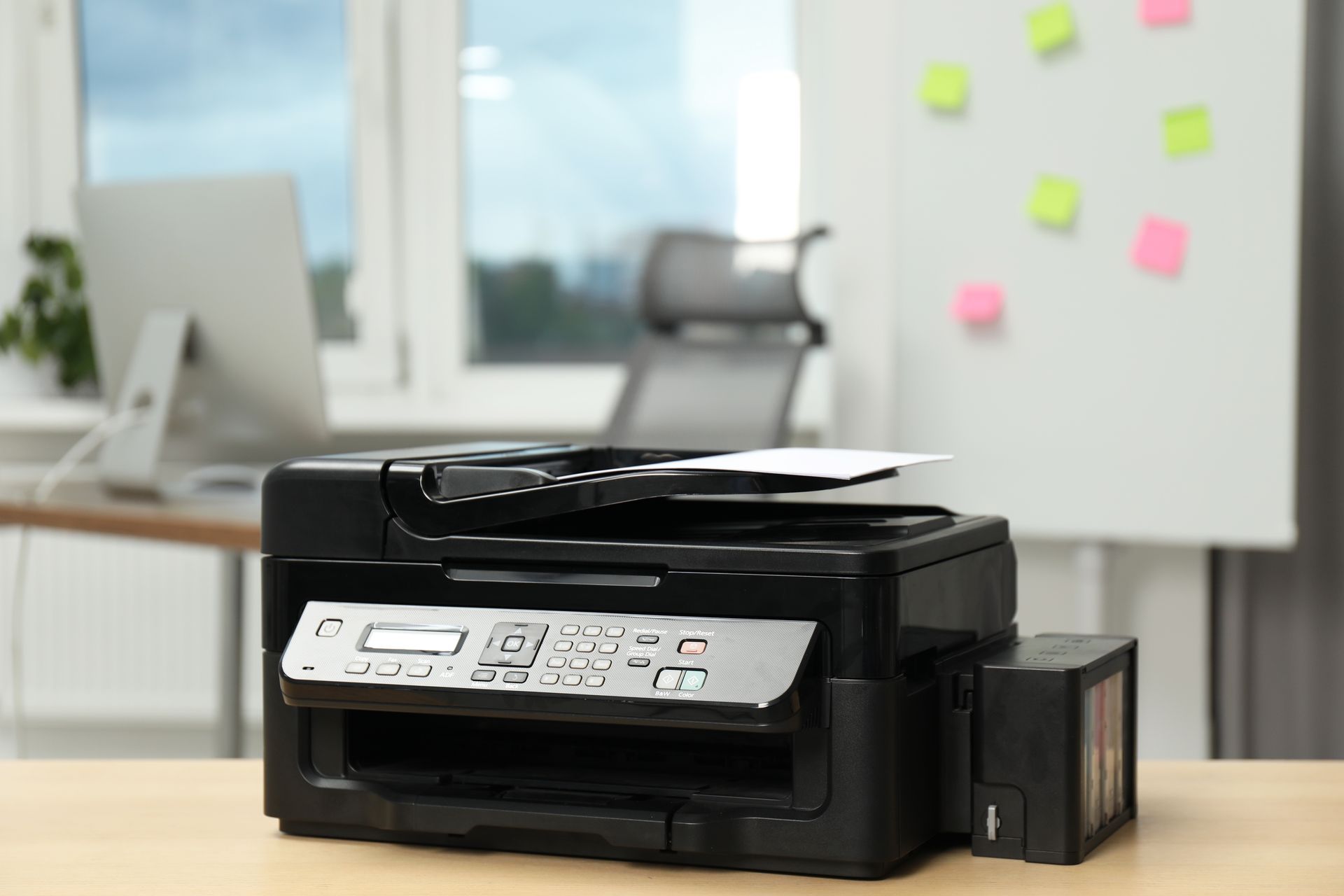 Black Printer on a Wooden Desk in an Office Setting — Tech Aid In Moffat Beach, QLD
