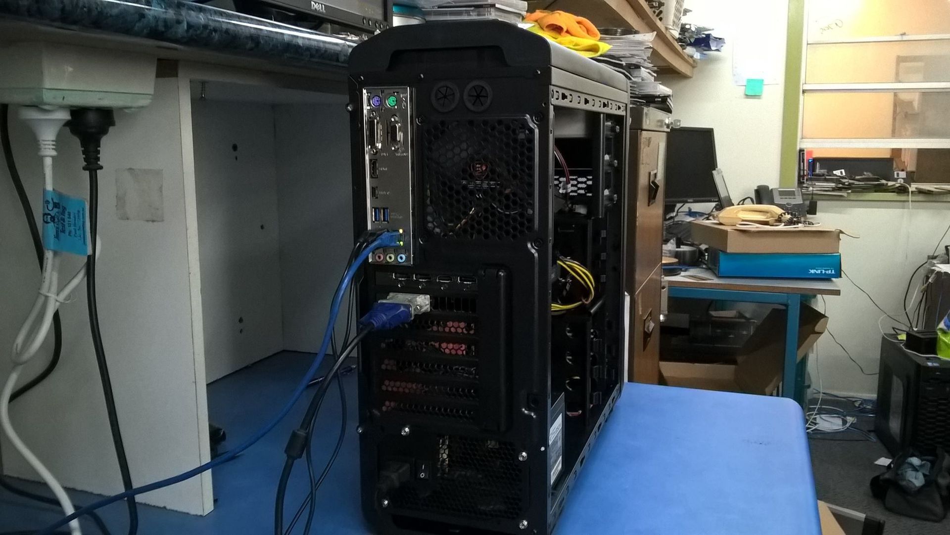 Black Computer Tower With Various Cables Plugged Into the Back — Tech Aid In Moffat Beach, QLD