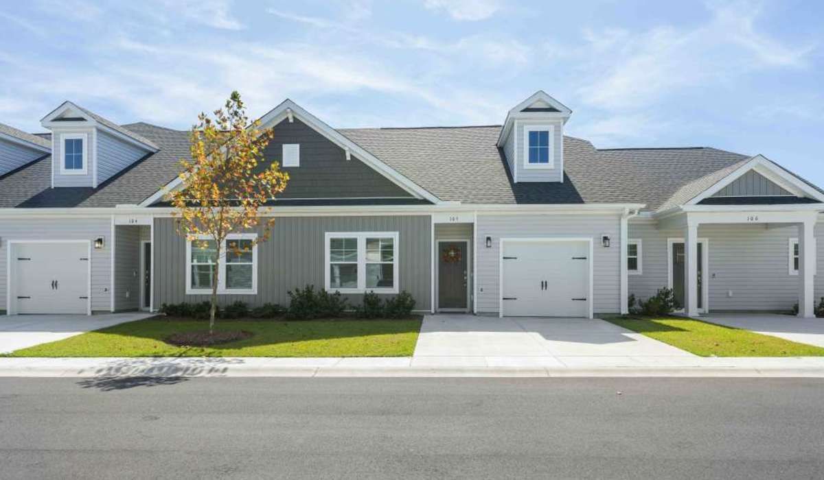 Exterior view of the apartment building at Reve Park Ridge in Little River, South Carolina