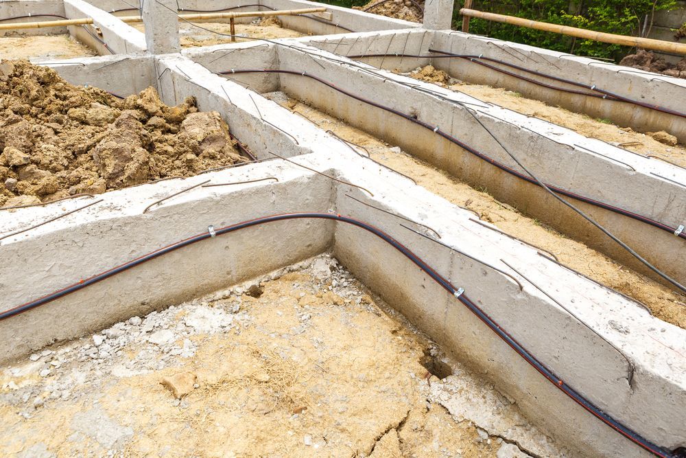 A Concrete Foundation For A House Is Being Built — ASAP Pest Control in Carindale, QLD