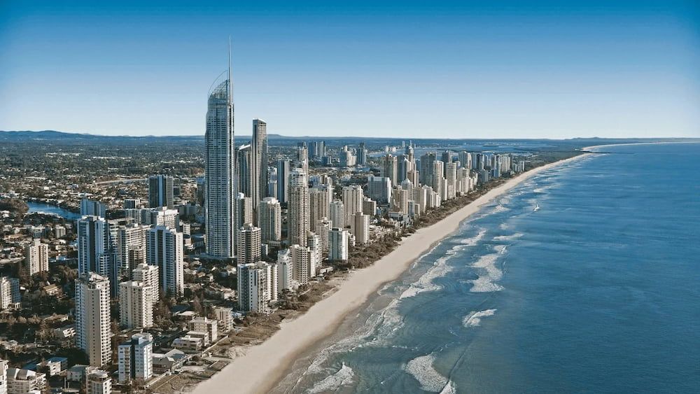 An Aerial View Of A City With A Beach — ASAP Pest Control in Gold Coast, QLD