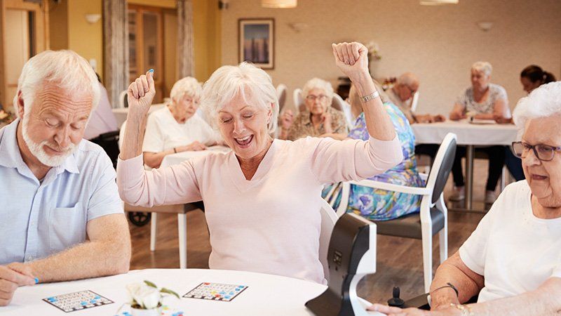Assisted Living Service — Seniors Playing Bingo in Penn Laird, VA