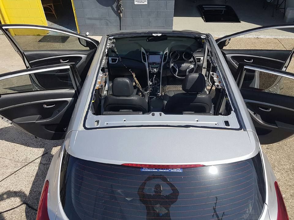 The Roof of a Car is Open and the Doors Are Open — Sunshine Coast Windscreens In Nambour, QLD