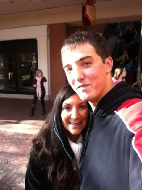 A man and a woman are posing for a picture