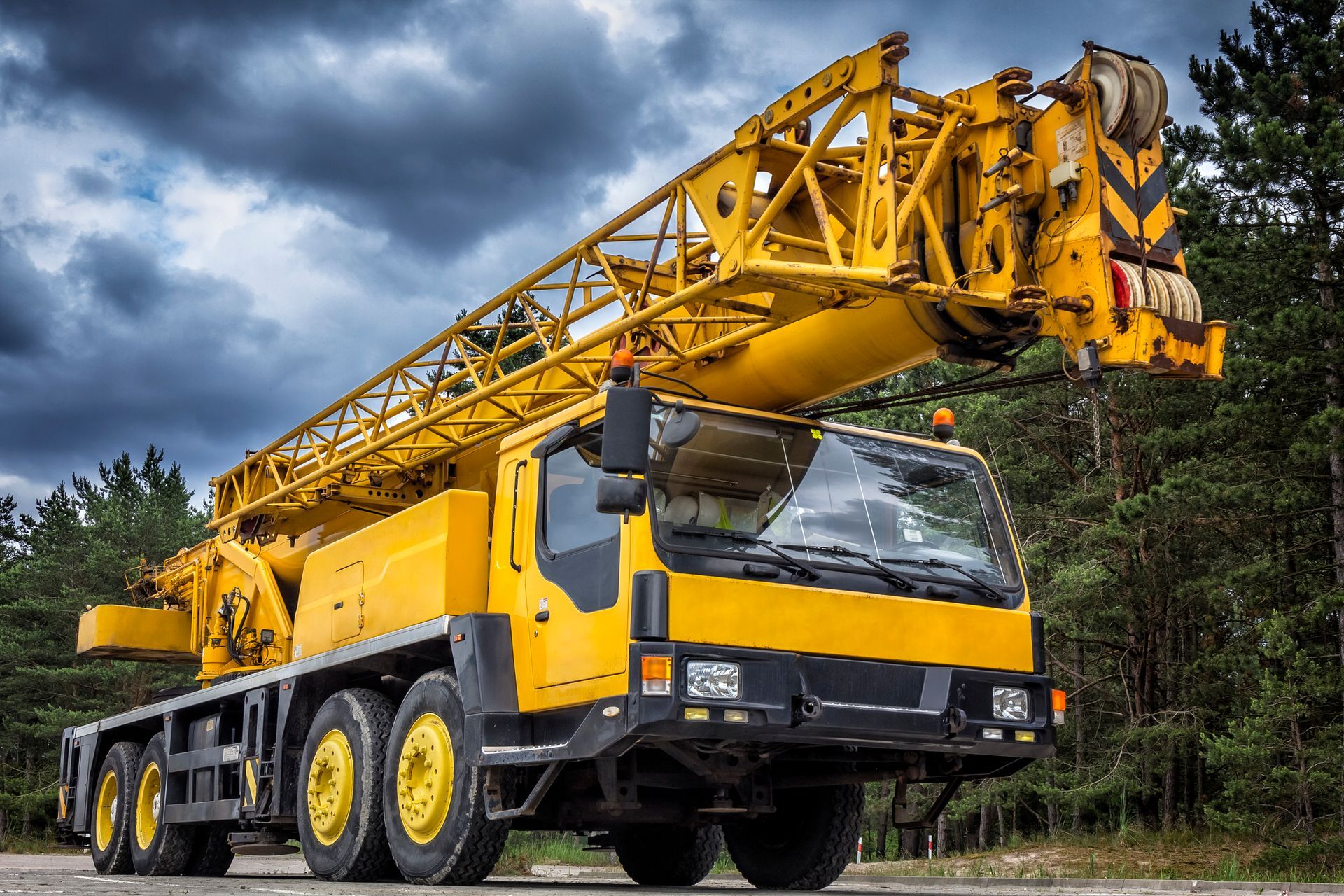 Yellow Mobile Crane in Road Construction — Wyong, Nsw — Mcphan Cranes & Transport
