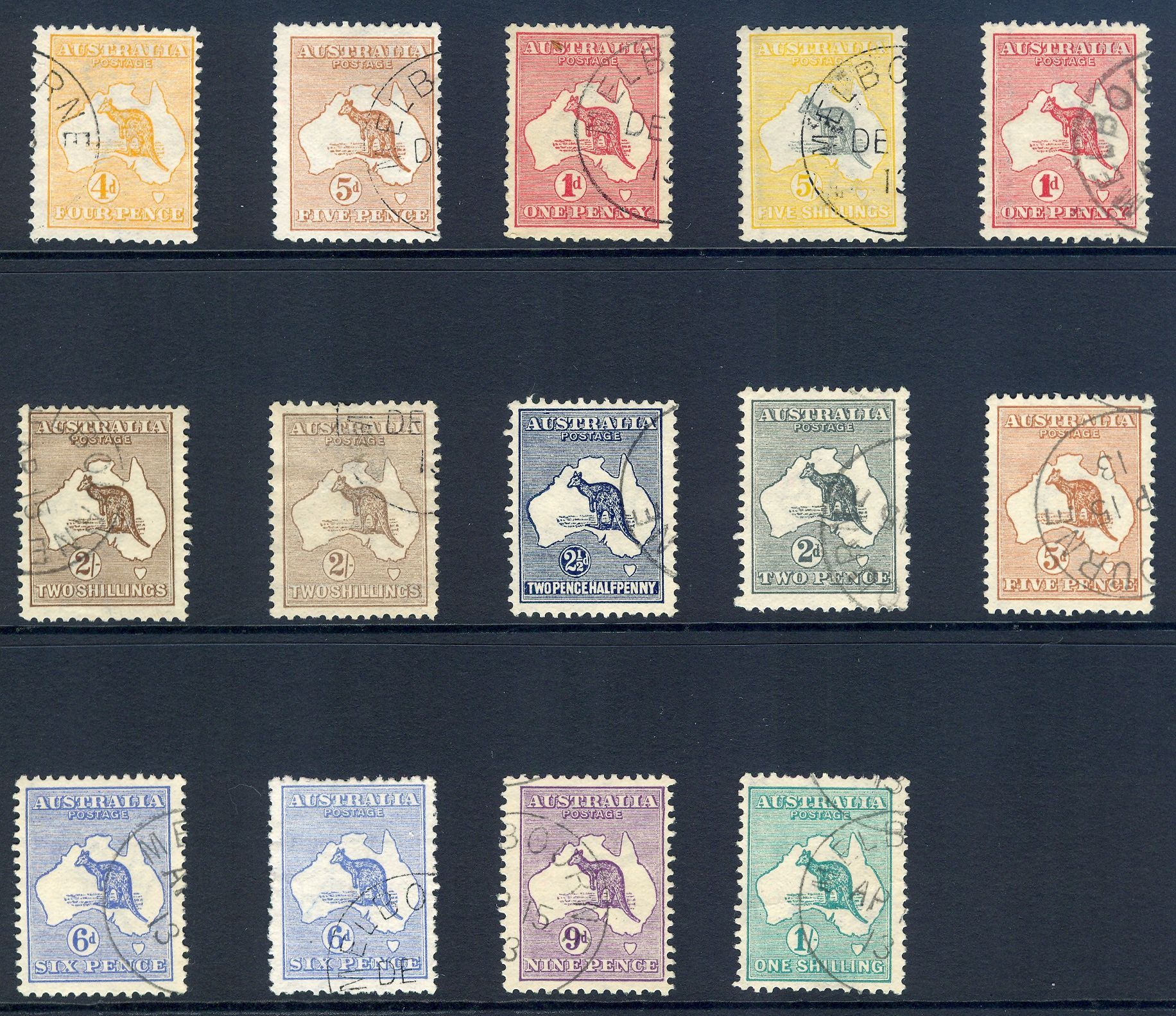 A collection of australian postage stamps on a black background