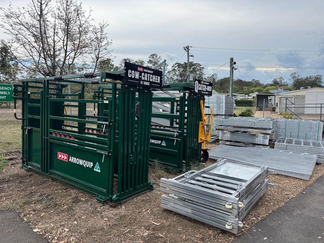 Green cattle crushes and metal panels displayed outdoors - Shed Constructions (QLD) In Gin Gin, QLD
