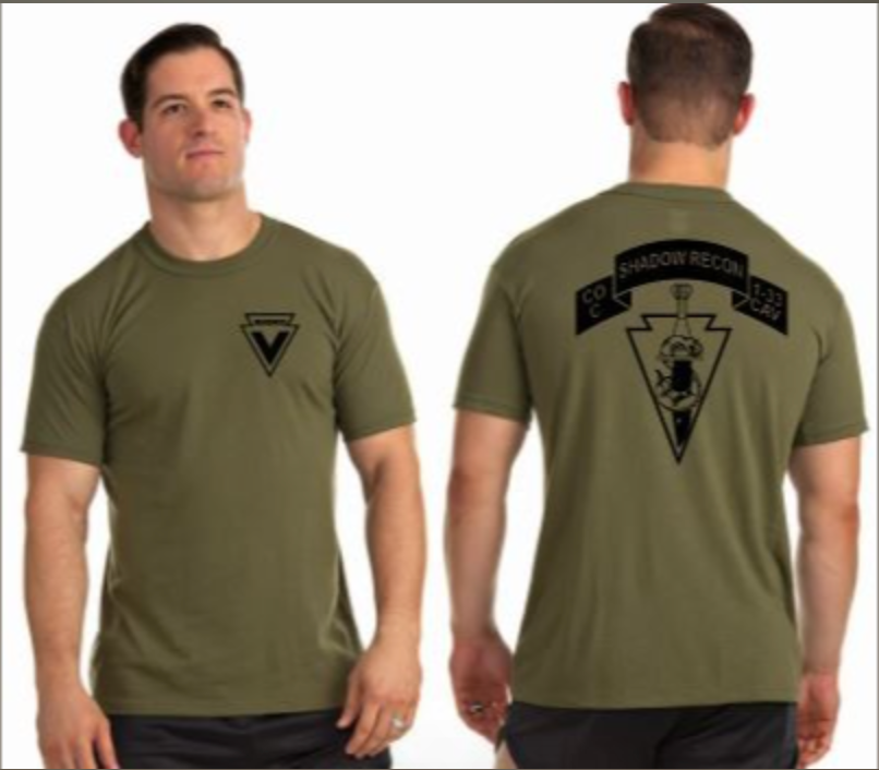 A man is wearing a green t-shirt that says shadow recon