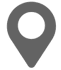 a map pin with a circle in the middle on a white background .