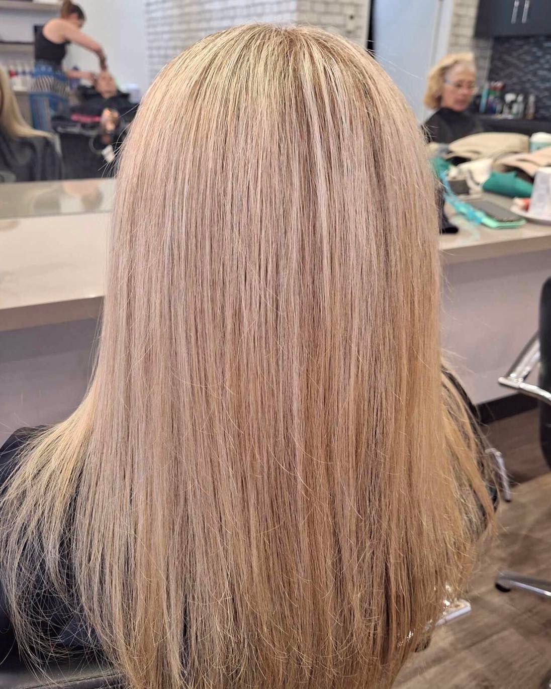 Long, Straight Blonde Hair in a Salon Setting — Artistry Of Hair in Redlynch, QLD