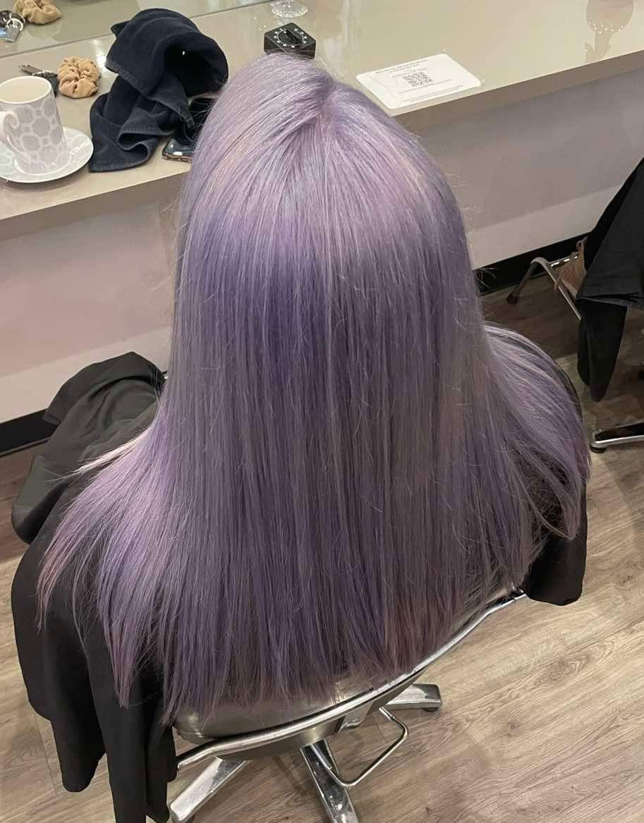 Woman's Hair With Rainbow Hues, Including Blue, Purple, Red, and Green — Artistry Of Hair in Redlynch, QLD
