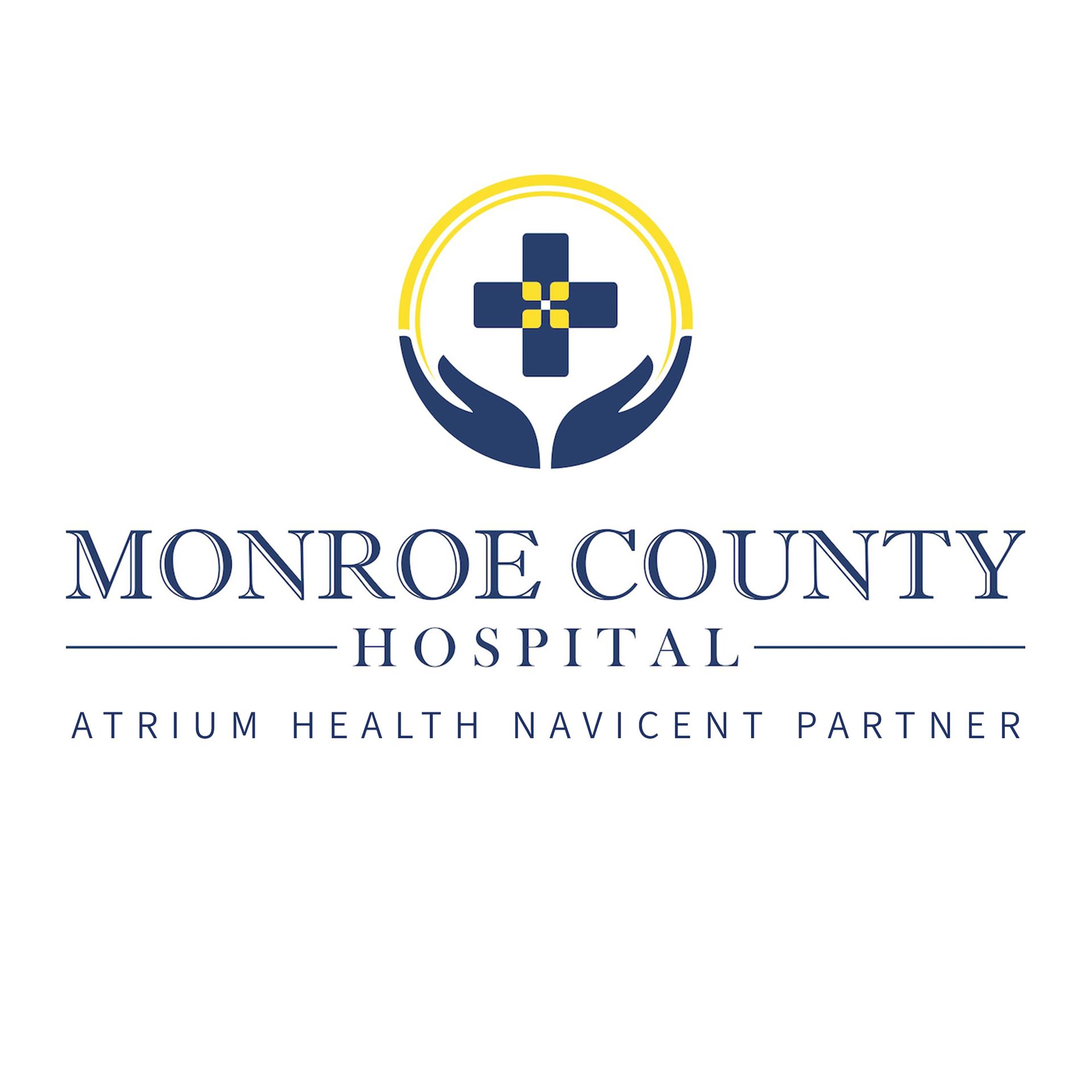 Monroe County Hospital logo with blue and gold medical cross and Atrium Health Navicent Partner text