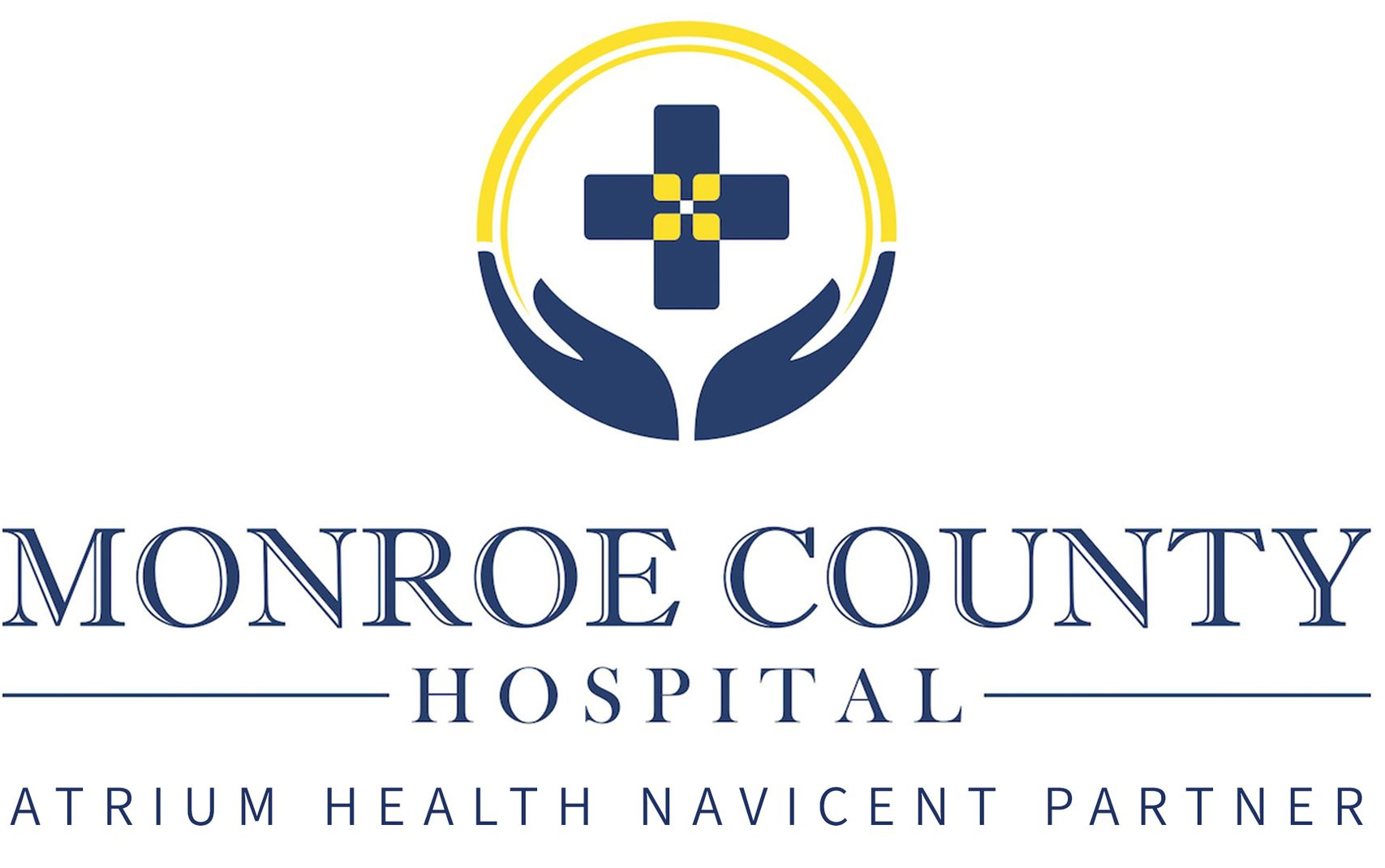 Monroe County Hospital logo with blue and gold cross emblem and Atrium Health Navicent partner text