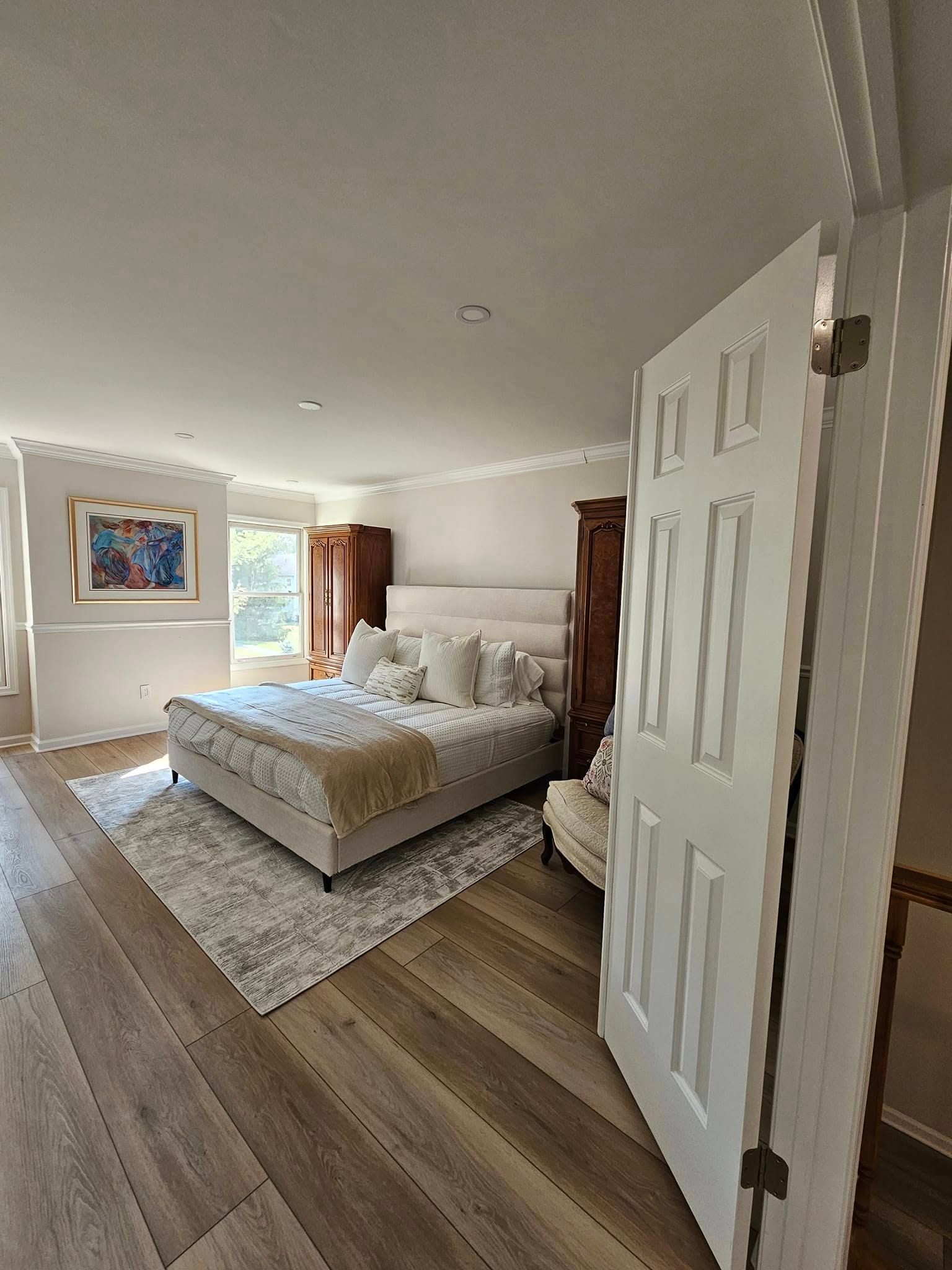 There is a large bed in the middle of the room.