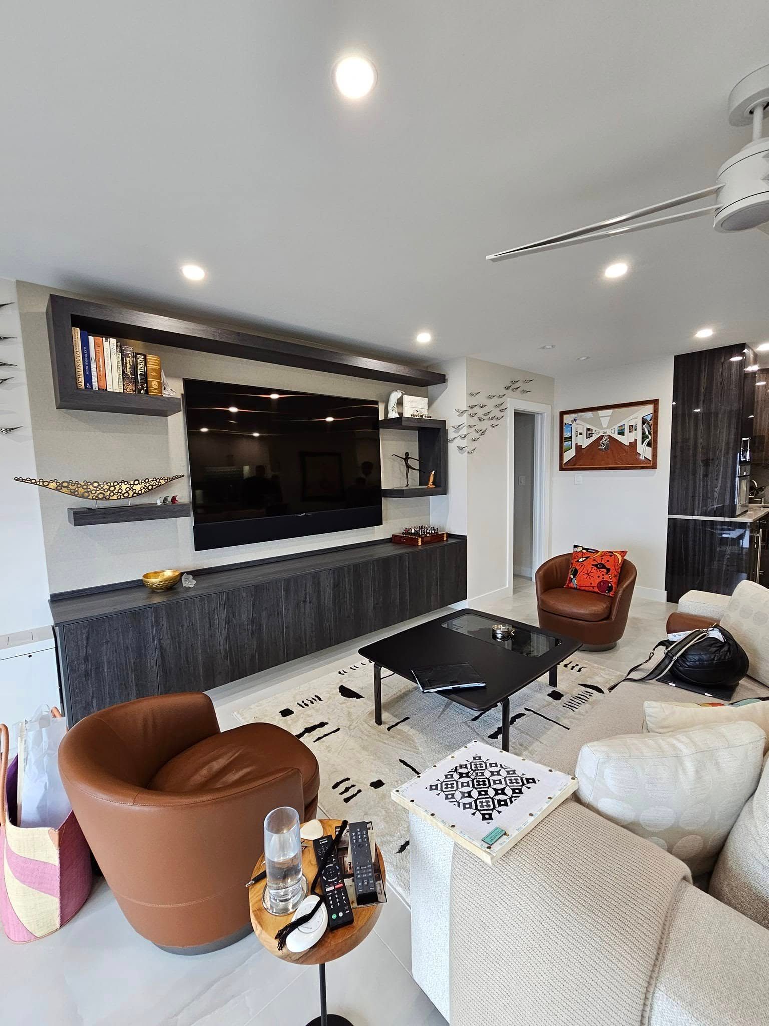 A living room filled with furniture and a flat screen tv.