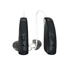 Two black in-the-ear hearing aids, with clear tubing, against a white background.