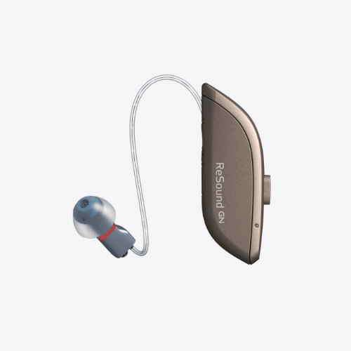 Beige hearing aid, ReSound brand, with a clear tube and ear mold on a white background.