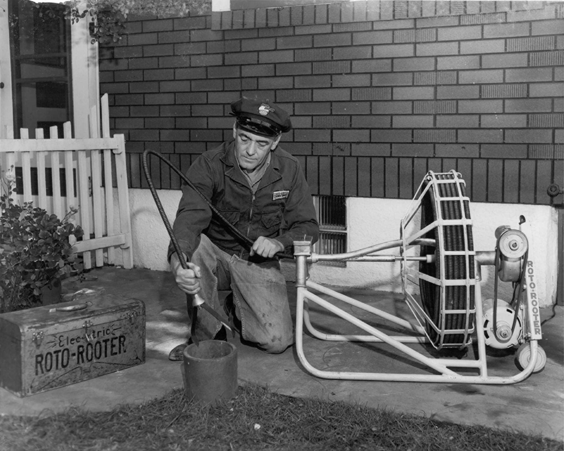 Man Cleaning Sewer - Peru, IL - Roto Rooter Sewer Service