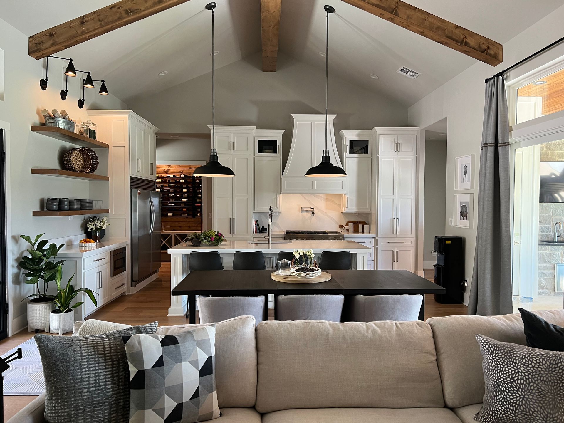 A living room with a couch and a table in it