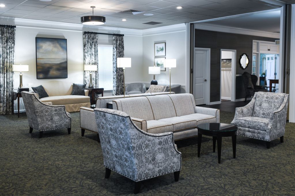 A living room filled with furniture and a couch.