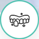 A white icon inside a teal circle showing a set of teeth with one dental veneer, accented by small sparkle symbols.