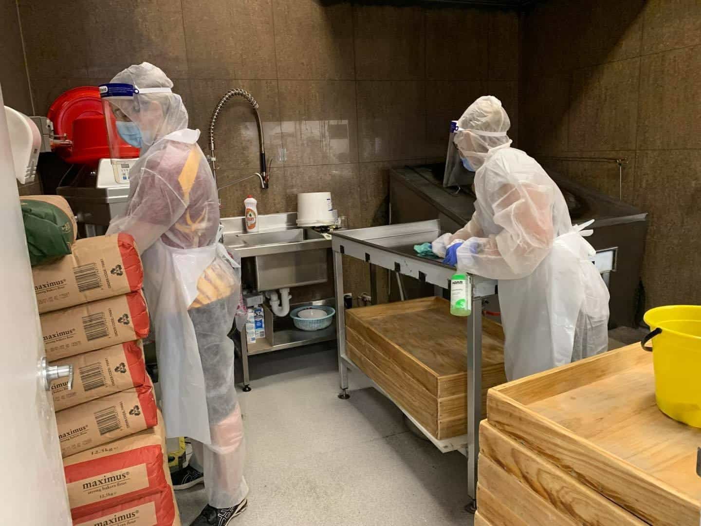 Professional Cleaner Cleaning Some Shelves — Carpet Cleaners in Tatura, VIC