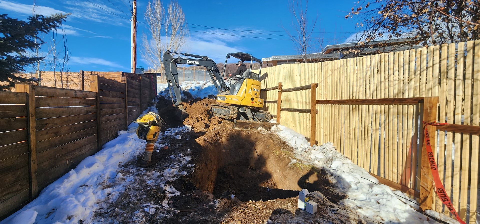 A white truck with the word rooter on it