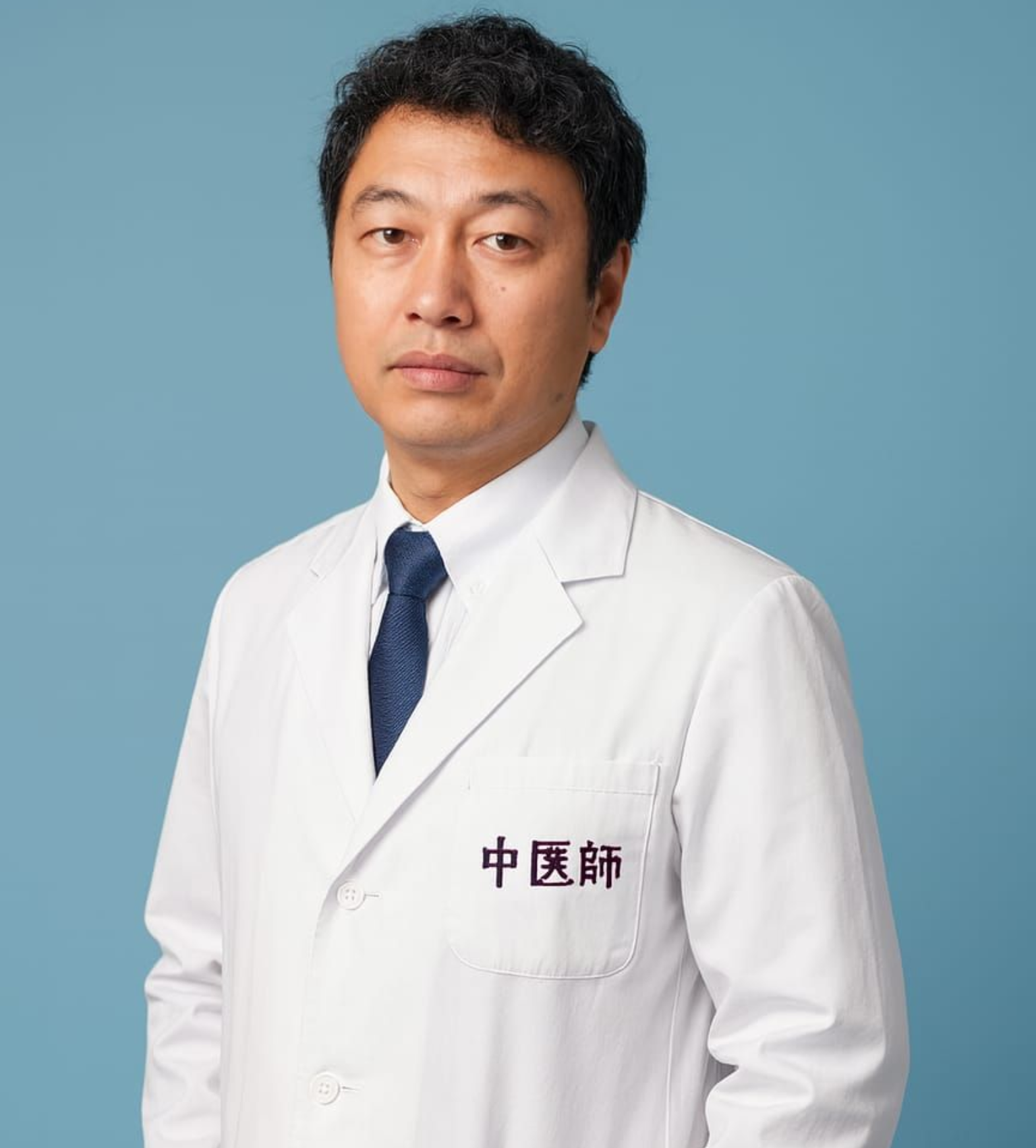 A woman is getting a foot massage from a therapist.