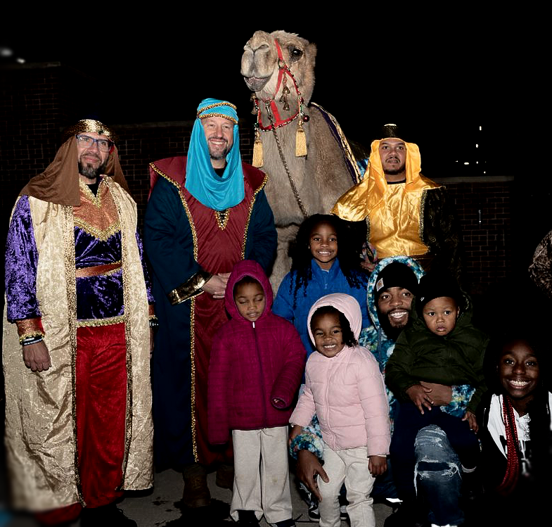 A sweet family poses for a photo op with the 