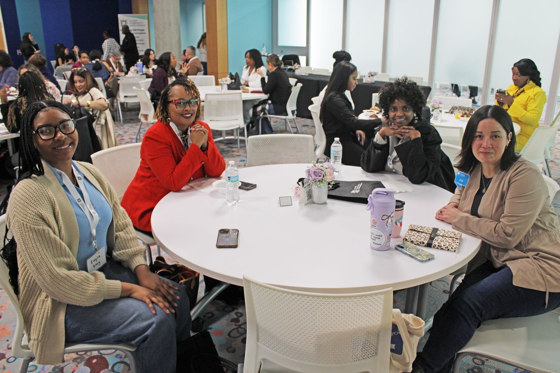 A group of women socializing at the Seeds of Success Summit.