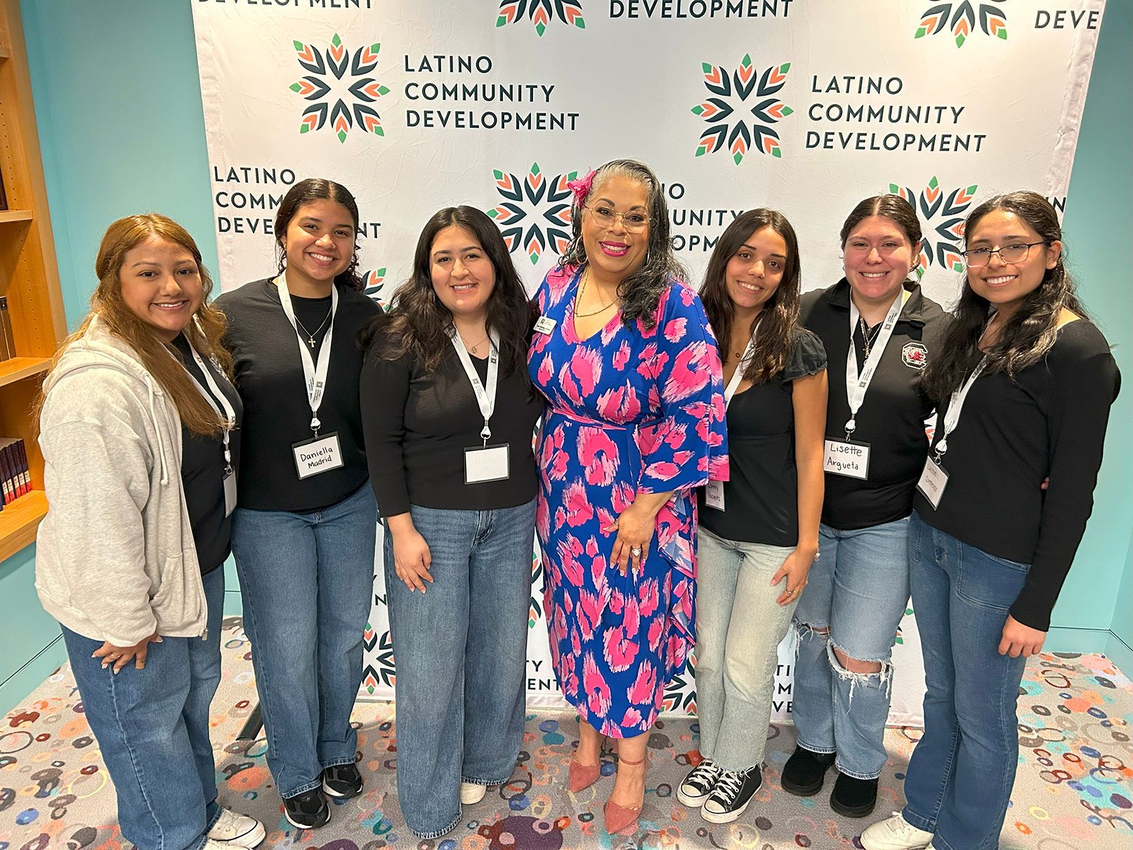 Tanya Rodriguez-Hodges with the young women who volunteered with LCD to make Seeds of Success Summit a triumph.