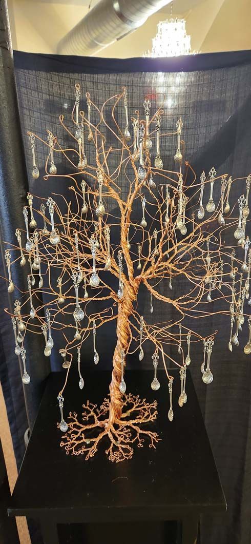 A copper wire tree sculpture.