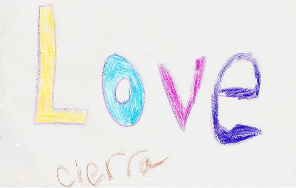 Child's crayon drawing of the word 