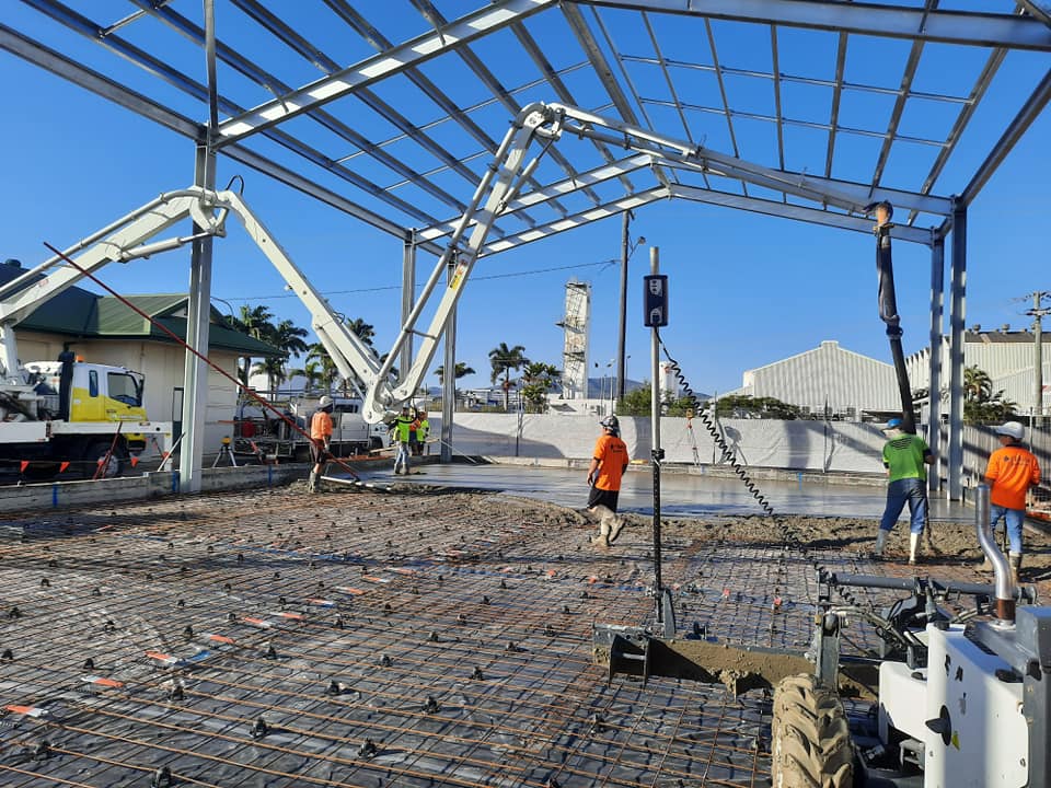 A group of construction workers are working on a building